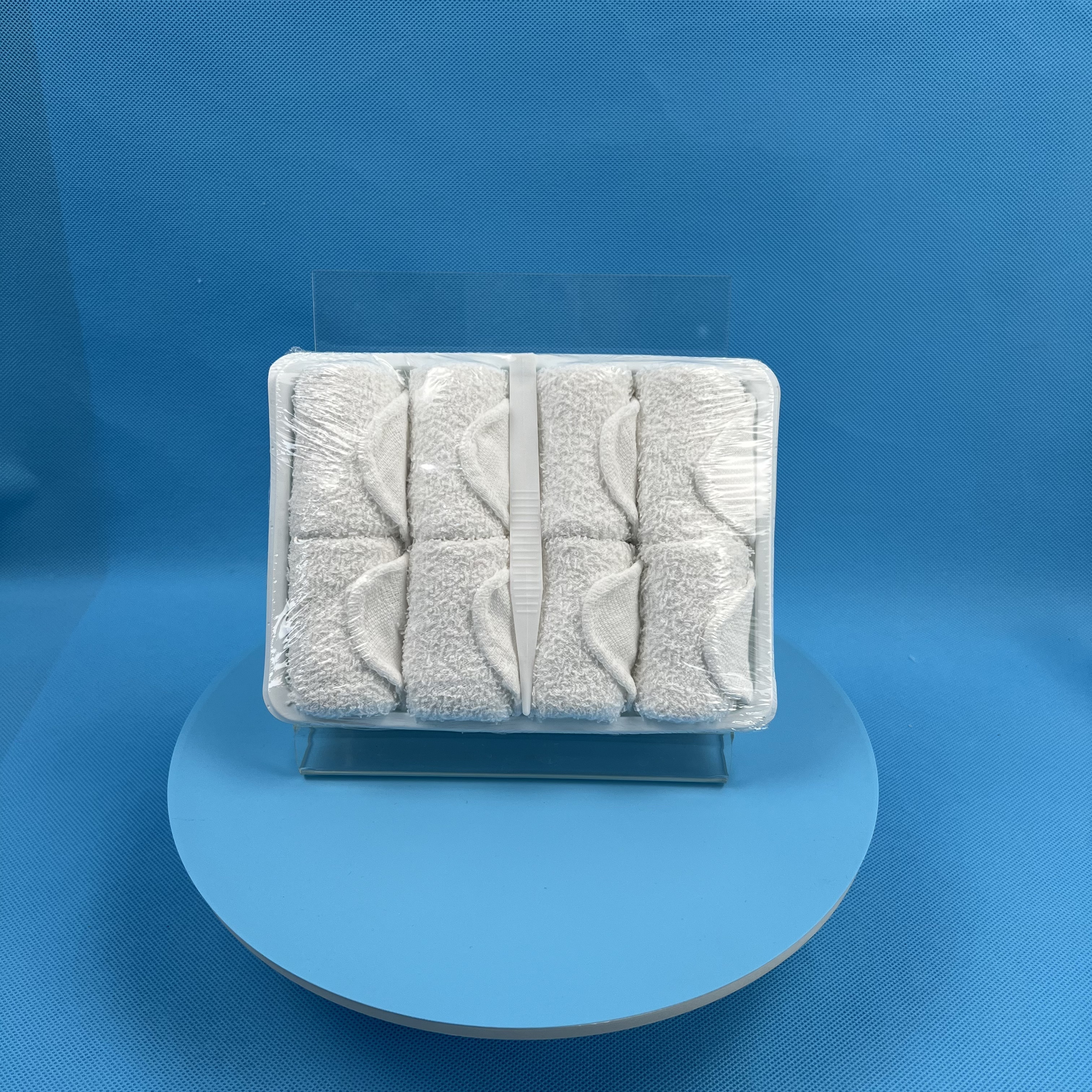 Airline passengers use cotton towels in tray